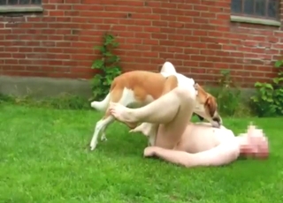 Dude with a shapely ass fucks his dog outside